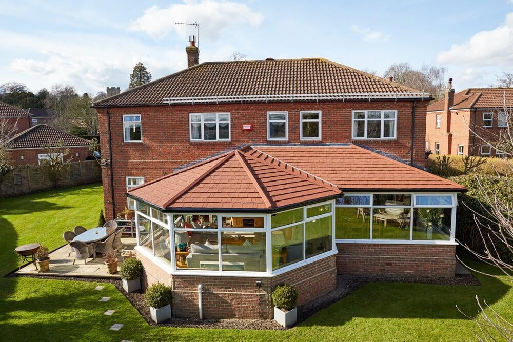 Icotherm roof with Red Britmet Shingle Tiles